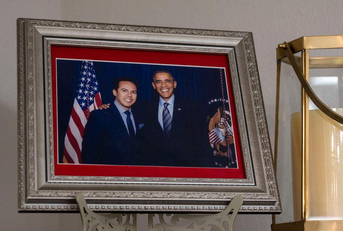 A photograph of Rev. Samuel Rodriguez Jr. with President Barack Obama sits on a shelf in his office earlier this month at New Season Church. Obama appointed him to multiple advisory councils.
