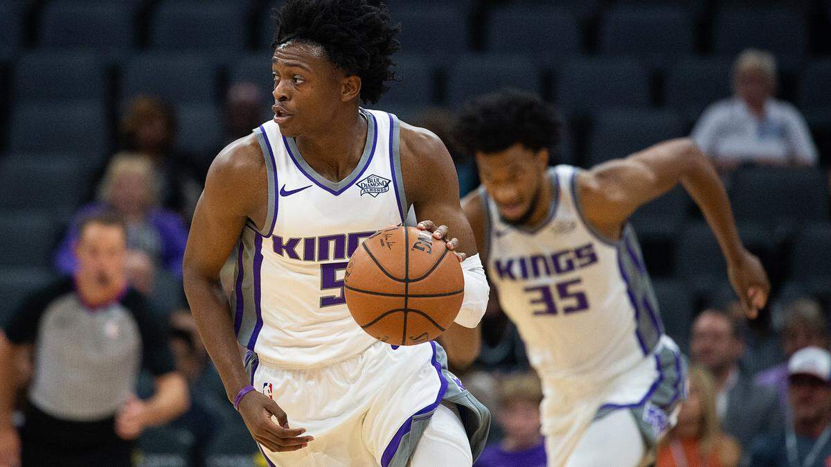 Sacramento Kings guard De’Aaron Fox (5) drives up court with rookie Marvin Bagley III on his trail during a preseason game against Maccabi Haifa at Golden 1 Center on Monday in Sacramento.