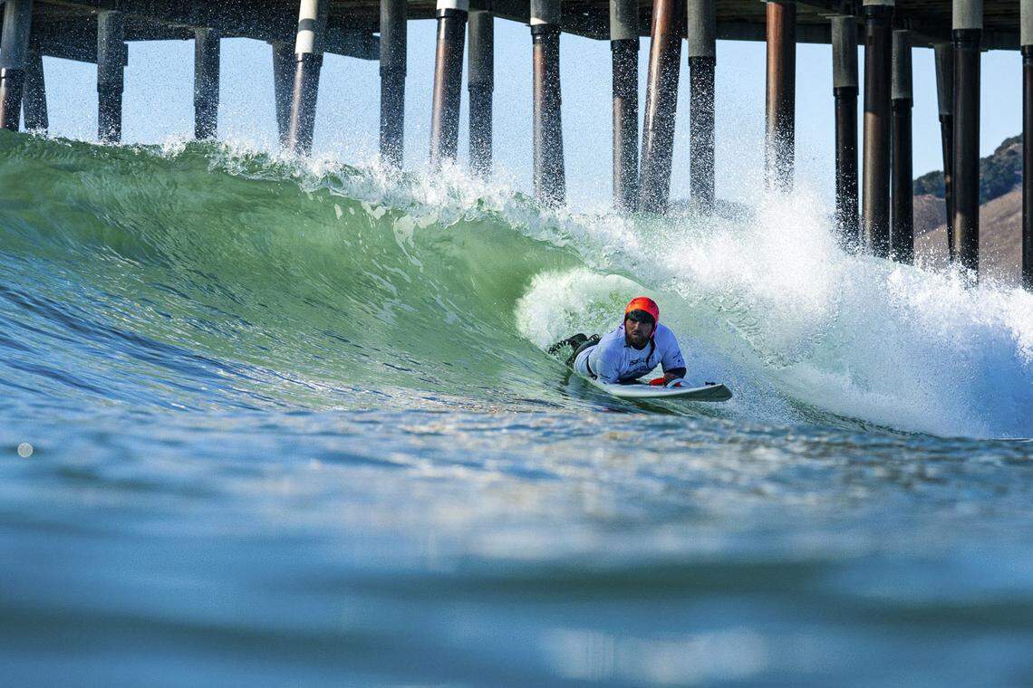 Jose Martinez rides a wave that led him to win the 2021 gold medal at the World Para Surfing Championship at Pismo Beach.