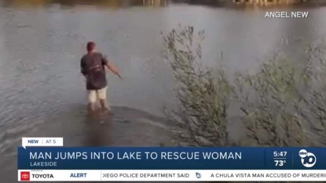 Scott Wolfe, 56, dashed into Lindo Lake near Lakeside to rescue a drowning woman who had been cursing and threatening deputies, a California video shows.