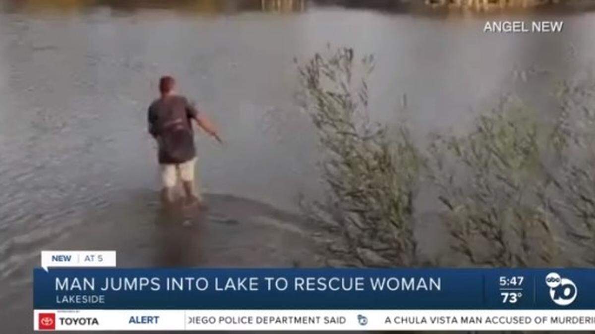 Scott Wolfe, 56, dashed into Lindo Lake near Lakeside to rescue a drowning woman who had been cursing and threatening deputies, a California video shows.