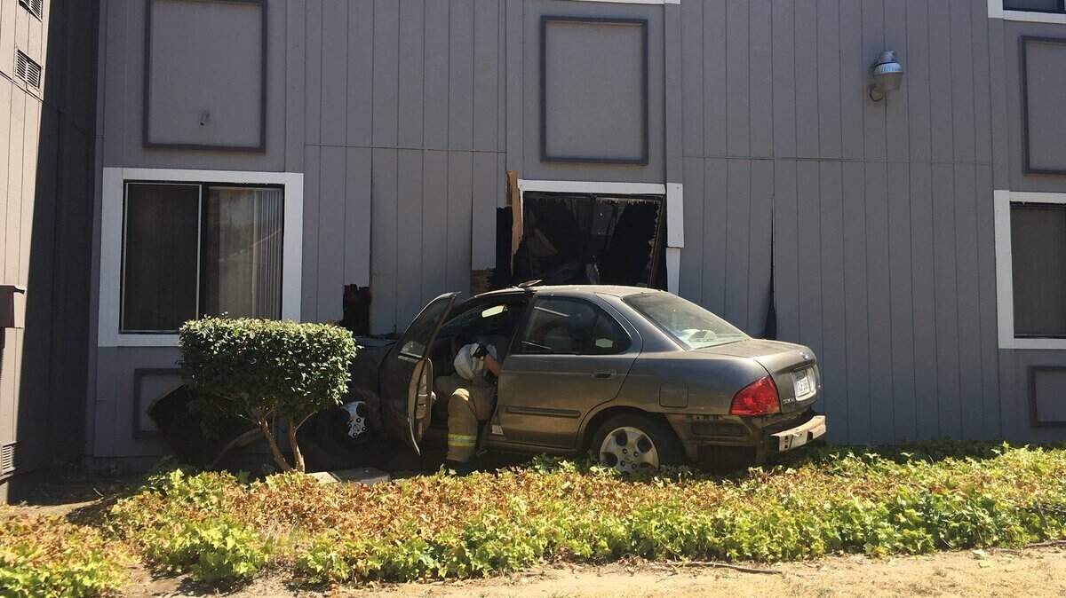 This sedan overshot a turn and crashed into an apartment in North Highlands on Monday, injuring two children inside, authorities said.