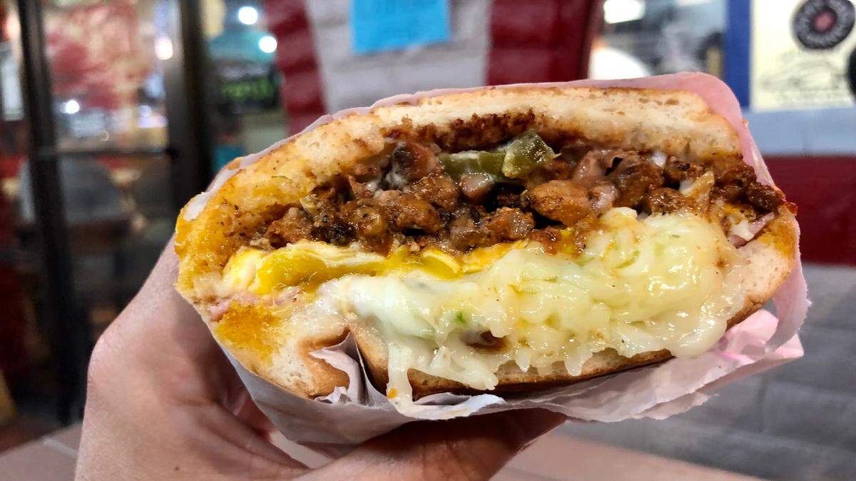 Pupuseria La Chicana has tortas, such as this take on a Cubano with a fried egg.