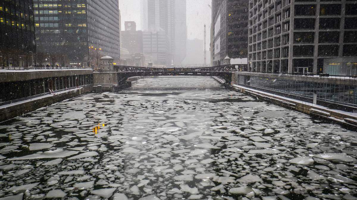 An icy Chicago River in Chicago on Monday. A post on Facebook by Westchester, Illinois, police jokingly announces that all crime has been canceled because of the cold, advising would-be crooks to “stay inside.”