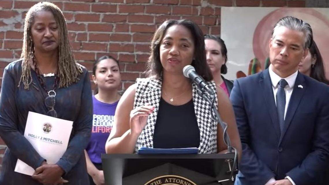 Los Angeles County Supervisor Holly Mitchell, left, and California Attorney General Rob Bonta flank Dr. Akila Weber, a La Mesa Democrat who represents the 79th District, at a news conference announcing the release of a report about whether birthing personnel are taking mandated training in recognizing their own implicit biases.
