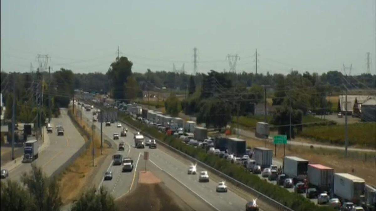 One lane of southbound Highway 99 is closed south of Elk Grove at Grant Line Road after a collision left a metal beam dangling from a bridge overpass Thursday morning, according to the California Highway Patrol.