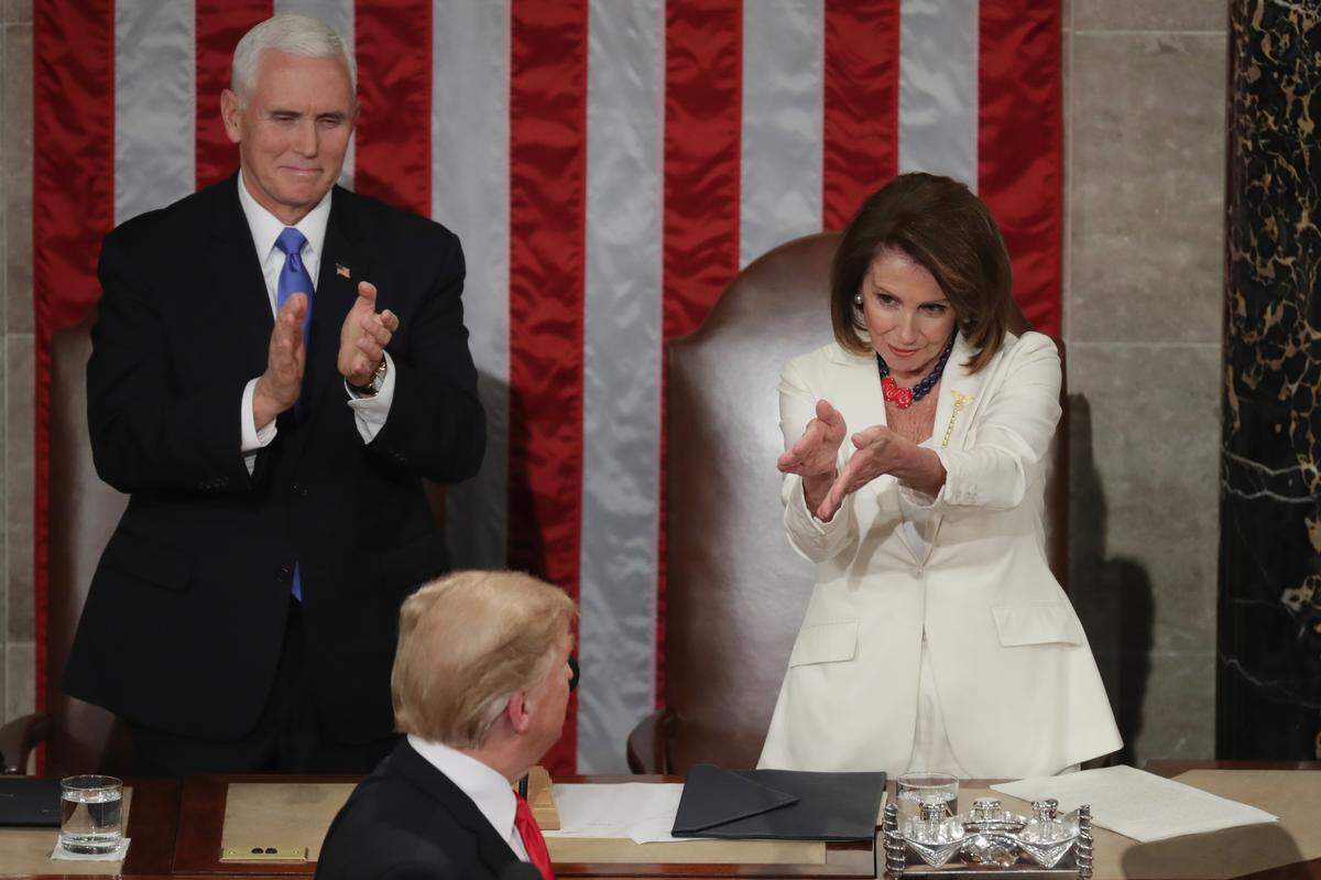 Vice President Mike Pence and Speaker Nancy Pelosi greet President Donald Trump just ahead of the State of the Union address in the chamber of the U.S. House of Representatives at the U.S. Capitol Building on Feb. 5, 2019 in Washington, D.C. President Trump's second State of the Union address was postponed one week due to a partial government shutdown.