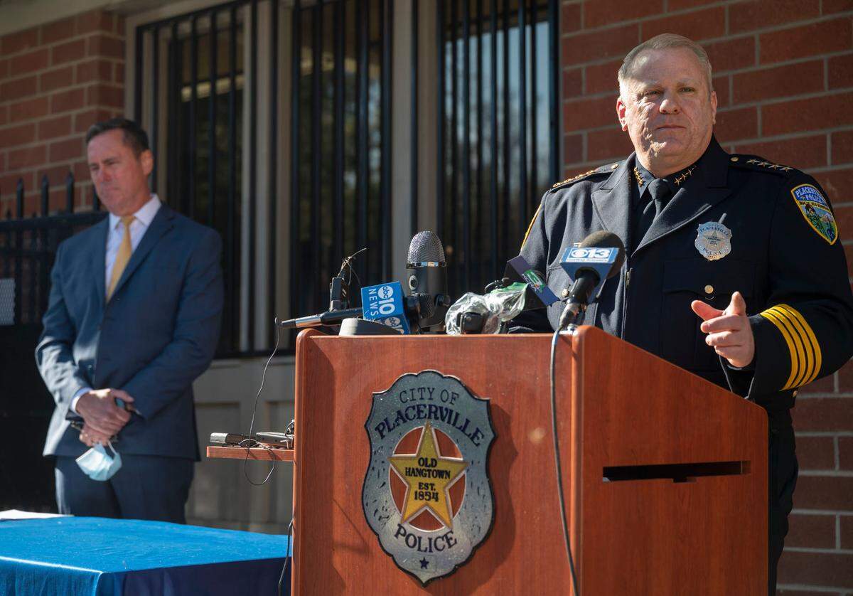 Placerville Police Chief Joseph Wren, right, takes questions as District Attorney Vern Pierson, left, listens at a press conference on Thursday, Feb. 4, 2020, outside police headquarters about the arrest of Jordan and Lindsay Piper, father and stepmother of Roman Lopez, who died under suspicious circumstances in January 2020. Lopez’s parents are charged with child abuse and poisoning.