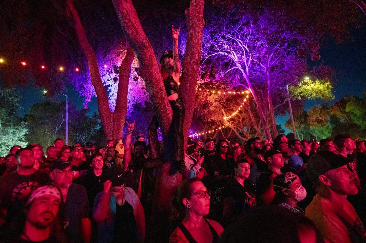 Festival attendees watch Slayer perform in the first day of the Aftershock festival on Thursday at Discovery Park.