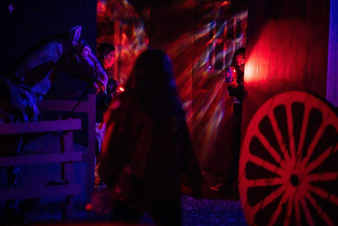 Combatants play zombie laser tag at Heartstoppers Haunted House in Rancho Cordova in 2021. The haunt runs through Saturday, Nov. 1.