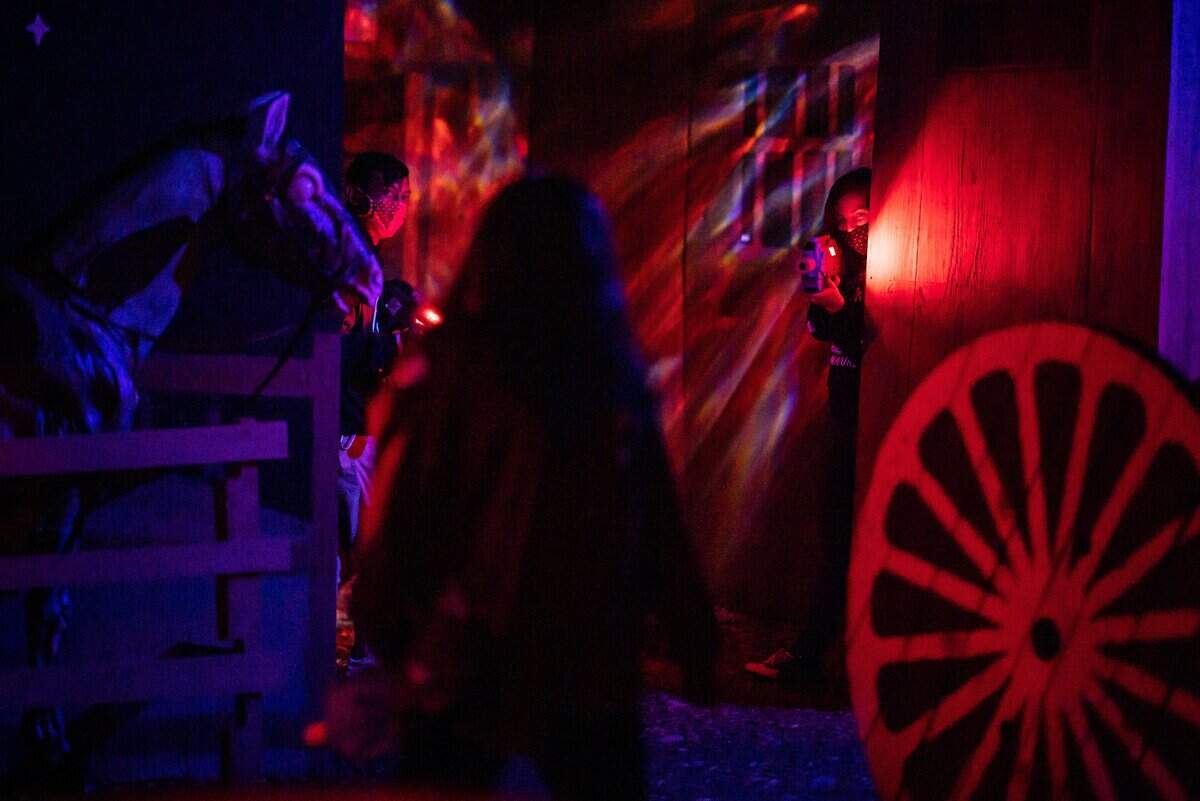 Combatants play zombie laser tag at Heartstoppers Haunted House in Rancho Cordova in 2021. The haunt runs through Saturday, Nov. 1.