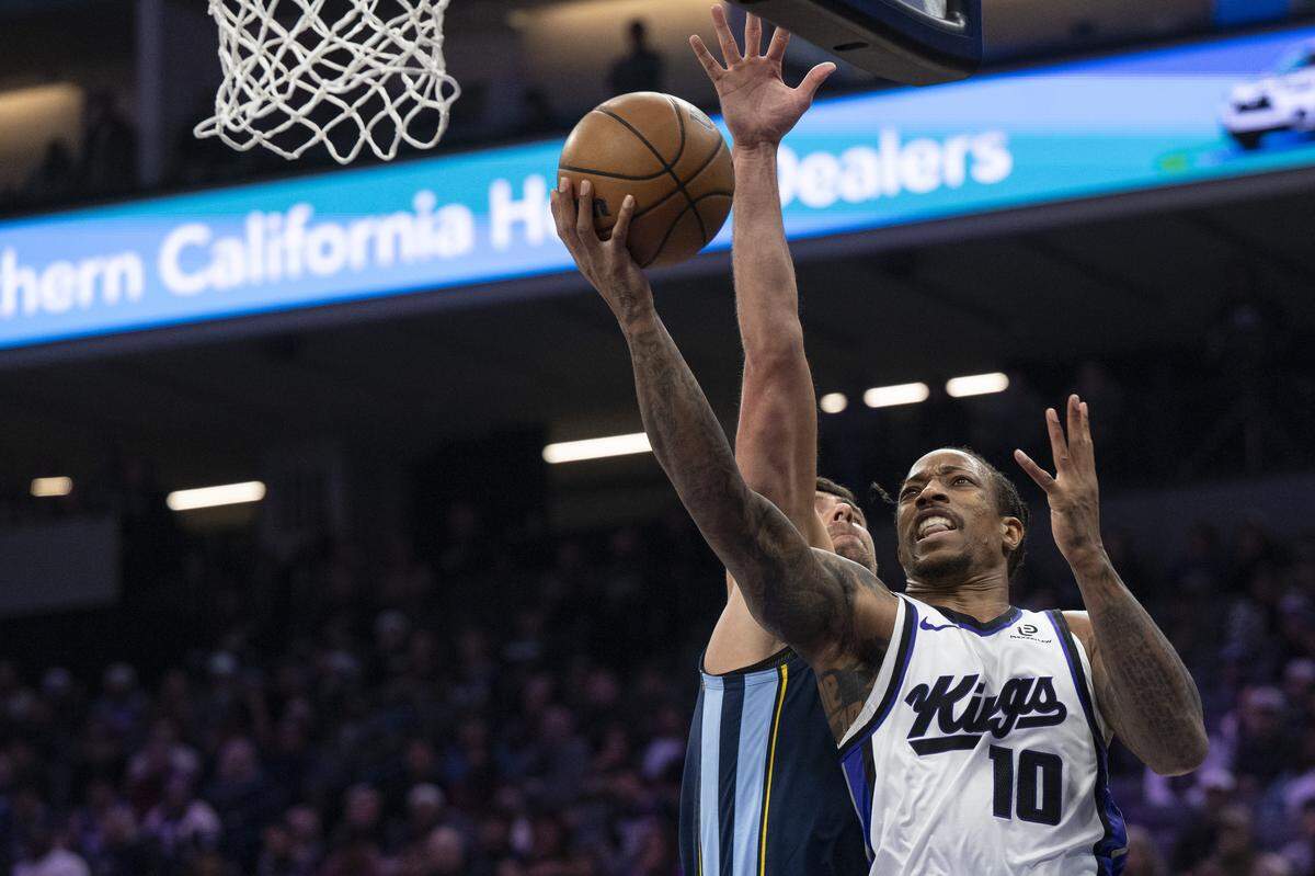 Sacramento Kings guard DeMar DeRozan (10) shoots during a game at Golden 1 Center in Sacramento on Sunday, Nov. 30, 2025.