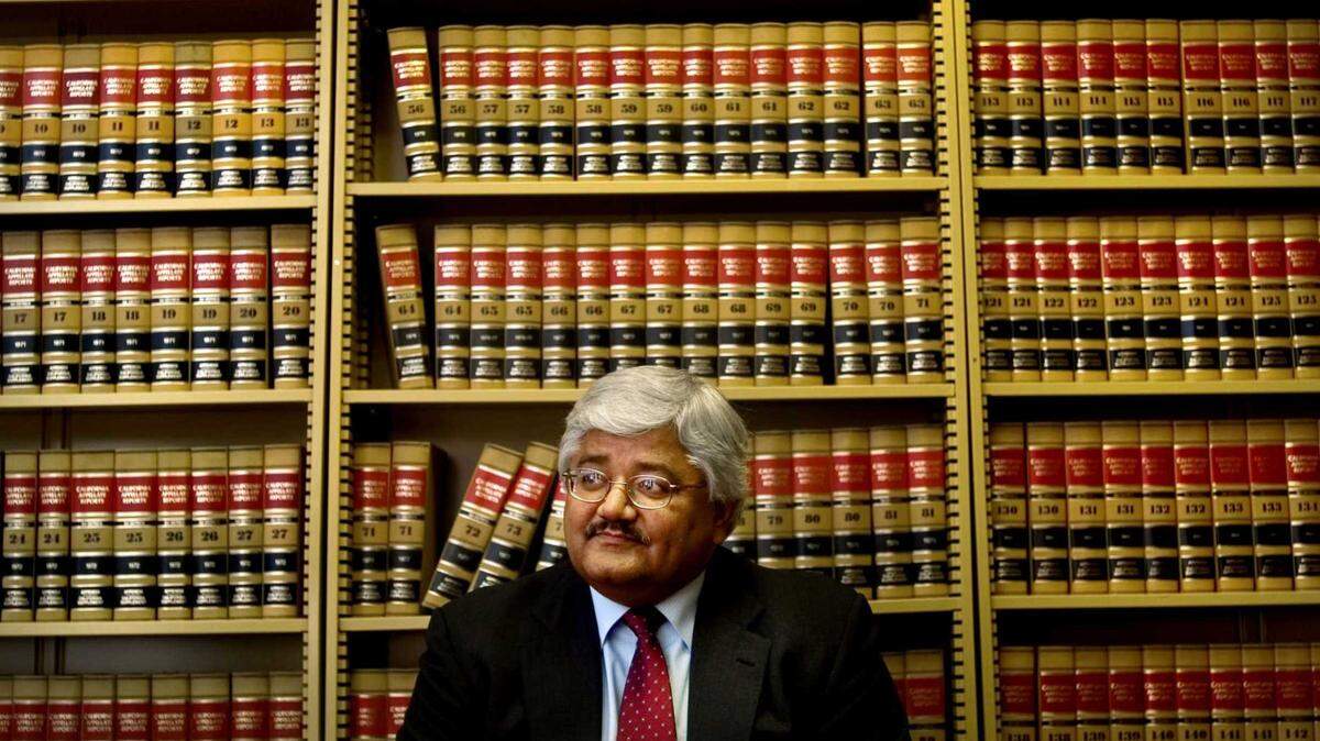 Sacramento County Public Defender Paulino Duran is seen at his office in Sacramento in 2006. Duran, Sacramento County’s chief public defender for 25 years, died Jan. 19, 2021, of complications of COVID-19. He is remembered for a fierce advocacy and a natural grace during his long legal career.