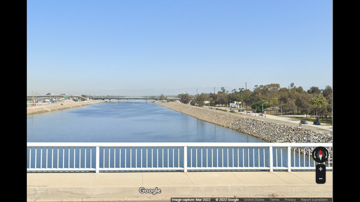 A man was arrested after his 1-year-old daughter’s body was found in a river below a bridge, California police said.