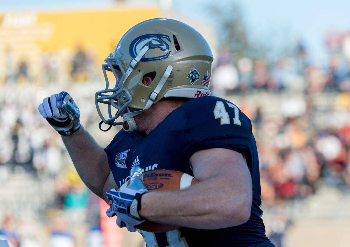 UC Davis running back Dalton Turay’s helmet features the mascot Gunrock during a game in 2014, one of the last seasons the thoroughbred was depicted in that spot. In recent years, the helmet logo has consisted of the letters C and A.