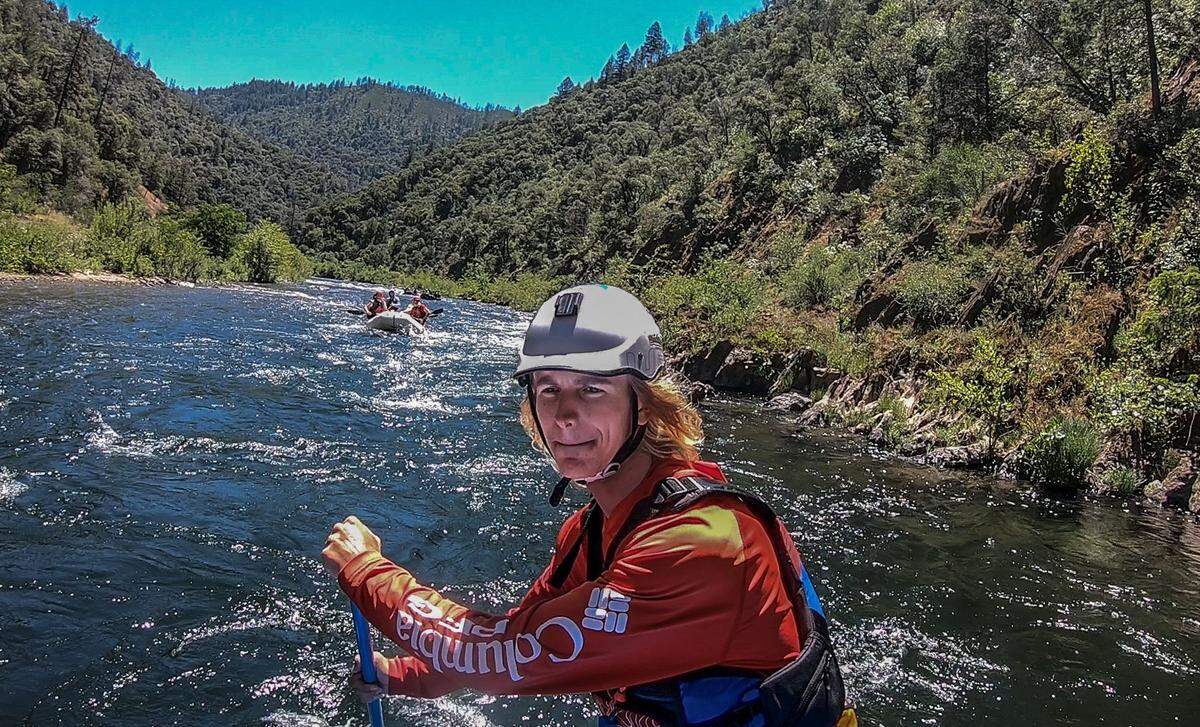 Joe Jester, a tour guide with Sierra Whitewater, maneuvers a raft carrying his group on the Middle Fork of the American River in May.