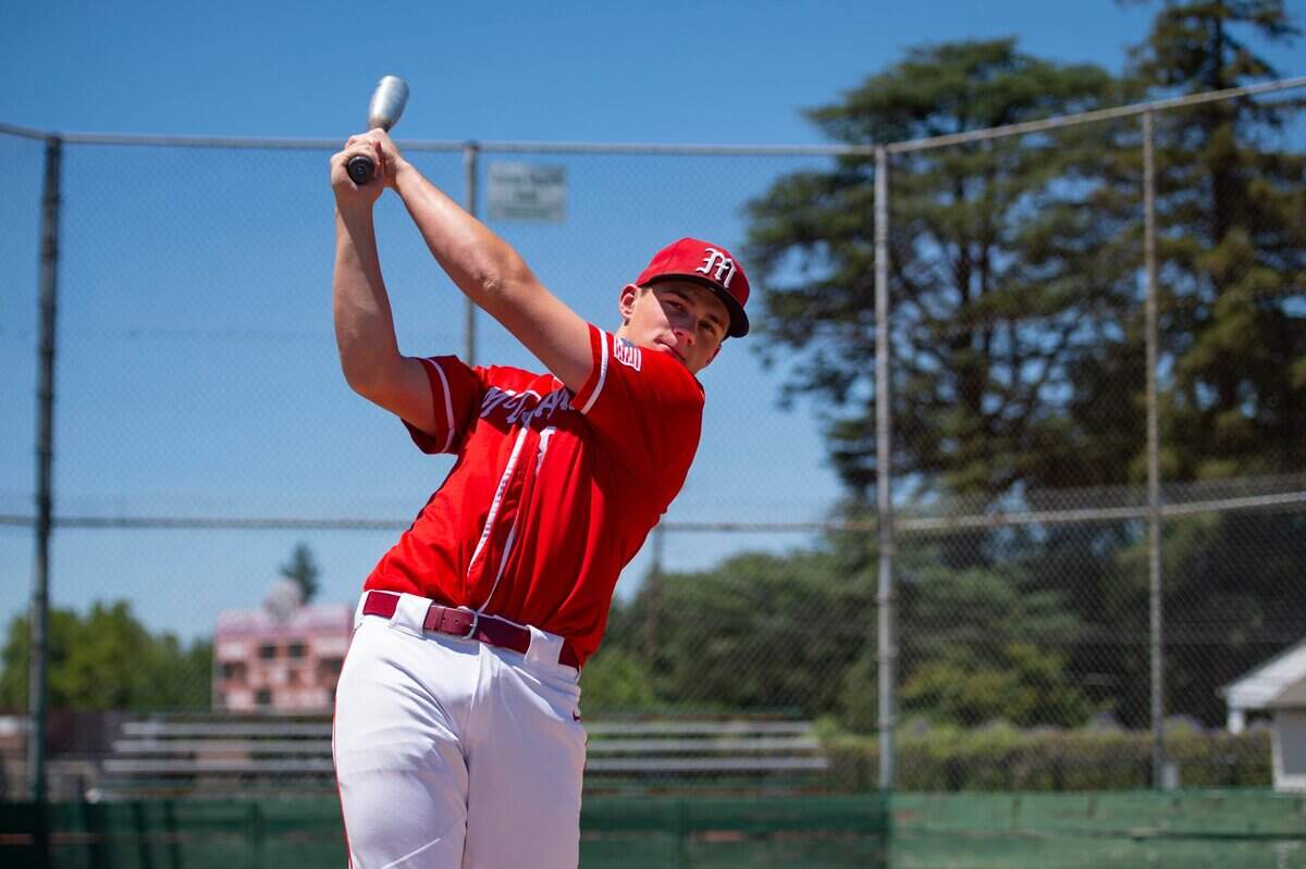 Sacramento Bee baseball player of the year Malcolm Moore, poses for photos in 2022 at C.K. McClatchy High School in Sacramento.