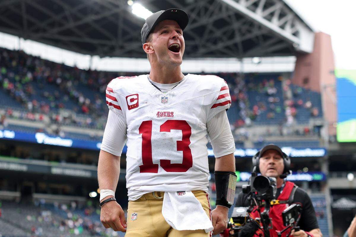 SEATTLE, WASHINGTON - SEPTEMBER 07: Brock Purdy #13 of the San Francisco 49ers celebrates after defeating the Seattle Seahawks during the game at Lumen Field on September 07, 2025 in Seattle, Washington. (Photo by Steph Chambers/Getty Images)