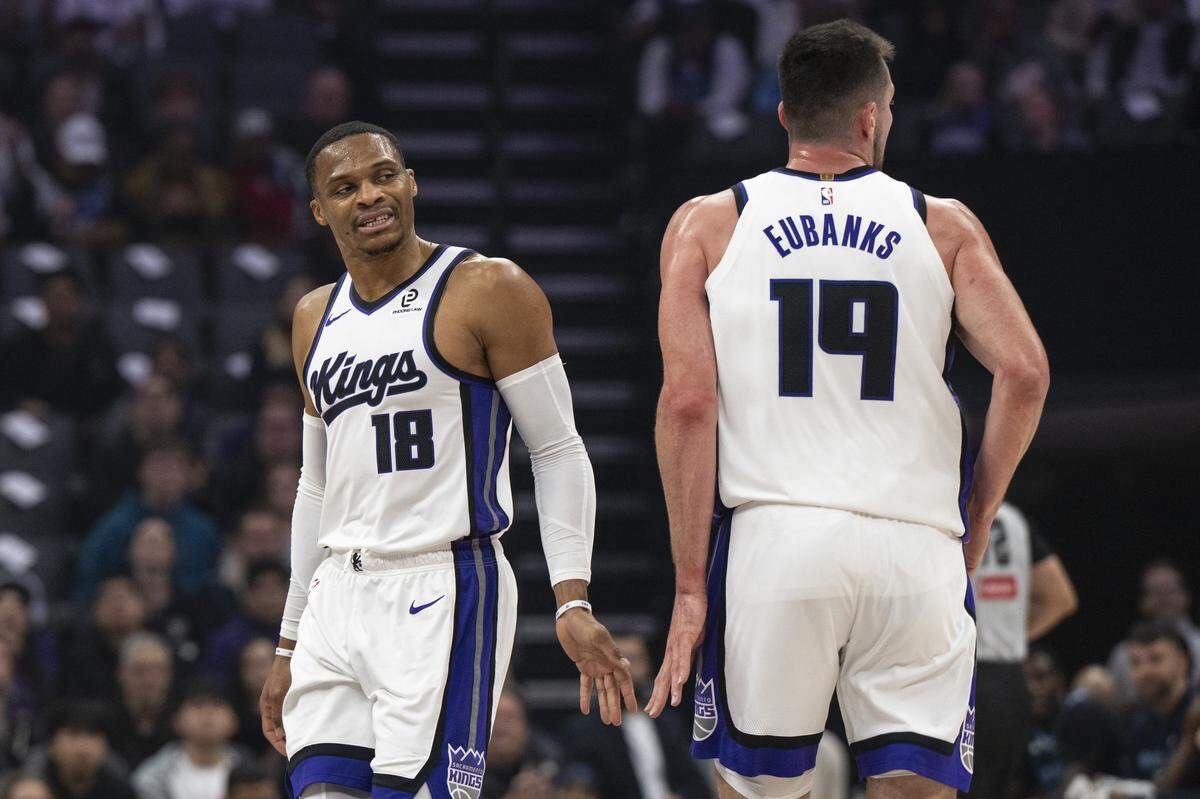 Sacramento Kings guard Russell Westbrook (18) and Sacramento Kings forward Drew Eubanks (19) high five after scoring during a game at Golden 1 Center in Sacramento on Sunday, Nov. 30, 2025.