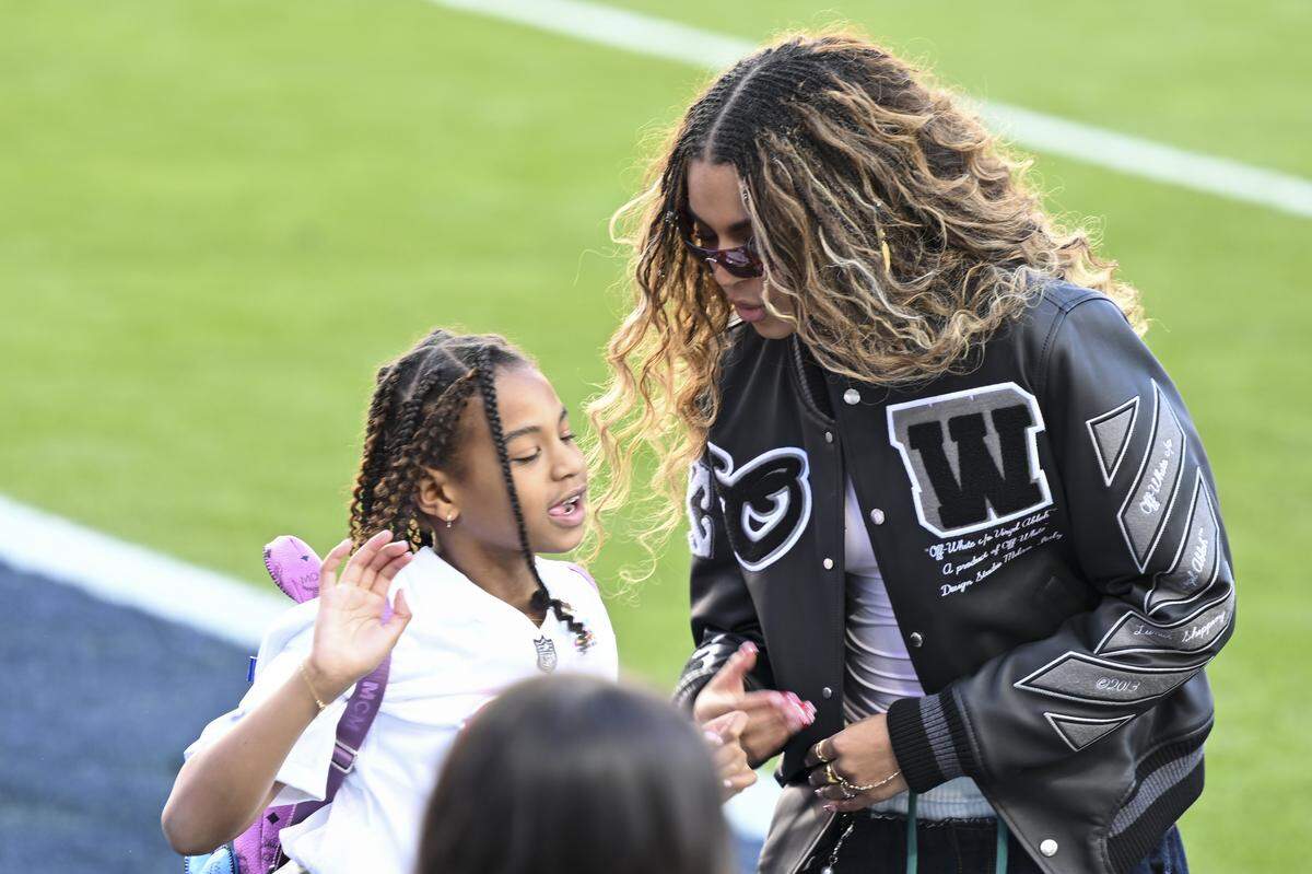 Jay-Z and Beyonce’s daughters Blue Ivy and Rumi before the start of Super Bowl LX at Levi’s Stadium in Santa Clara on Sunday, Feb. 8, 2026.