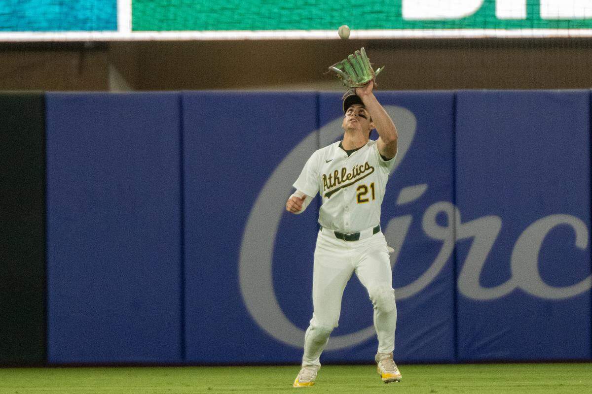 Tampa Bay Rays outfielder Christopher Morel (24) hits a fly ball to Athletics outfielder Tyler Soderstrom (21) to end the seventh inning during a game at Sutter Health Park on Monday, Aug. 11, 2025, in West Sacramento.