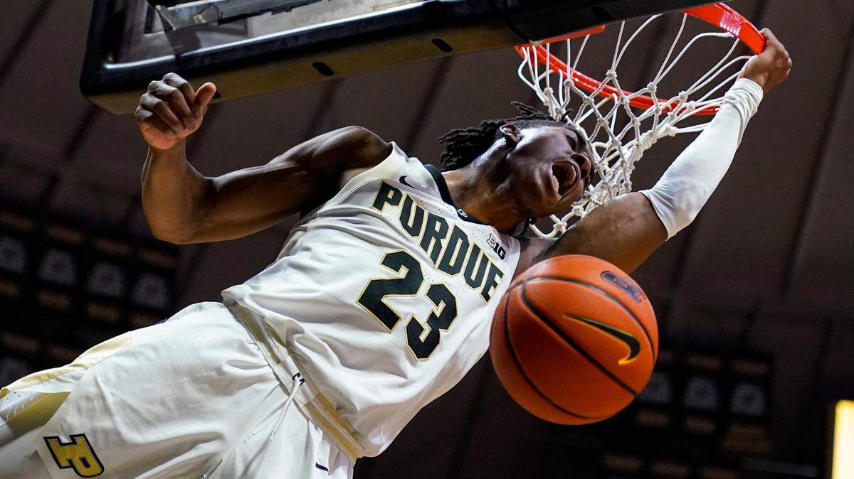 Purdue guard Jaden Ivey (23) reacts after a dunk against Iowa during the second half of an NCAA college basketball game in West Lafayette, Ind., Friday, Dec. 3, 2021. (AP Photo/Michael Conroy)