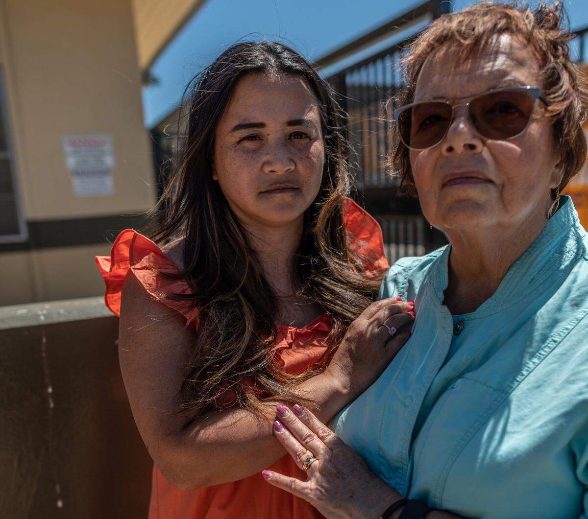  Judy Weldon, 73, right, who was a teacher, and Thao Ha, 41, left, who was a student, at the time of the 1989 Cleveland Elementary School shooting, talked about the traumatic impact it had on their lives on Monday June 21, 2021 in Stockton. It was Has first time back on campus since her childhood when gunman, Patrick Purdy, shot and killed five school children and wounded 32 others in the playground. Ha said she wore an orange dress in support of gun violence awareness.