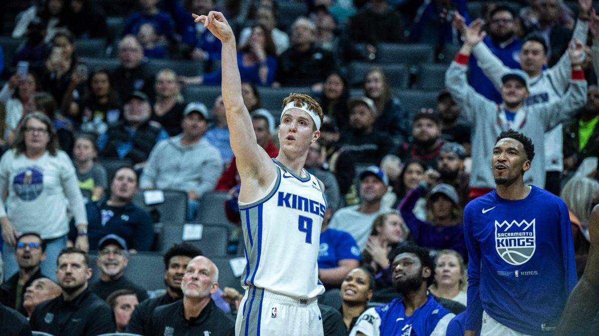 Sacramento Kings guard Kevin Huerter (9) follows through with a three-point shot against the Chicago Bulls on Sunday, Dec. 4, 2022 during an NBA basketball game at Golden 1 Center in Sacramento.