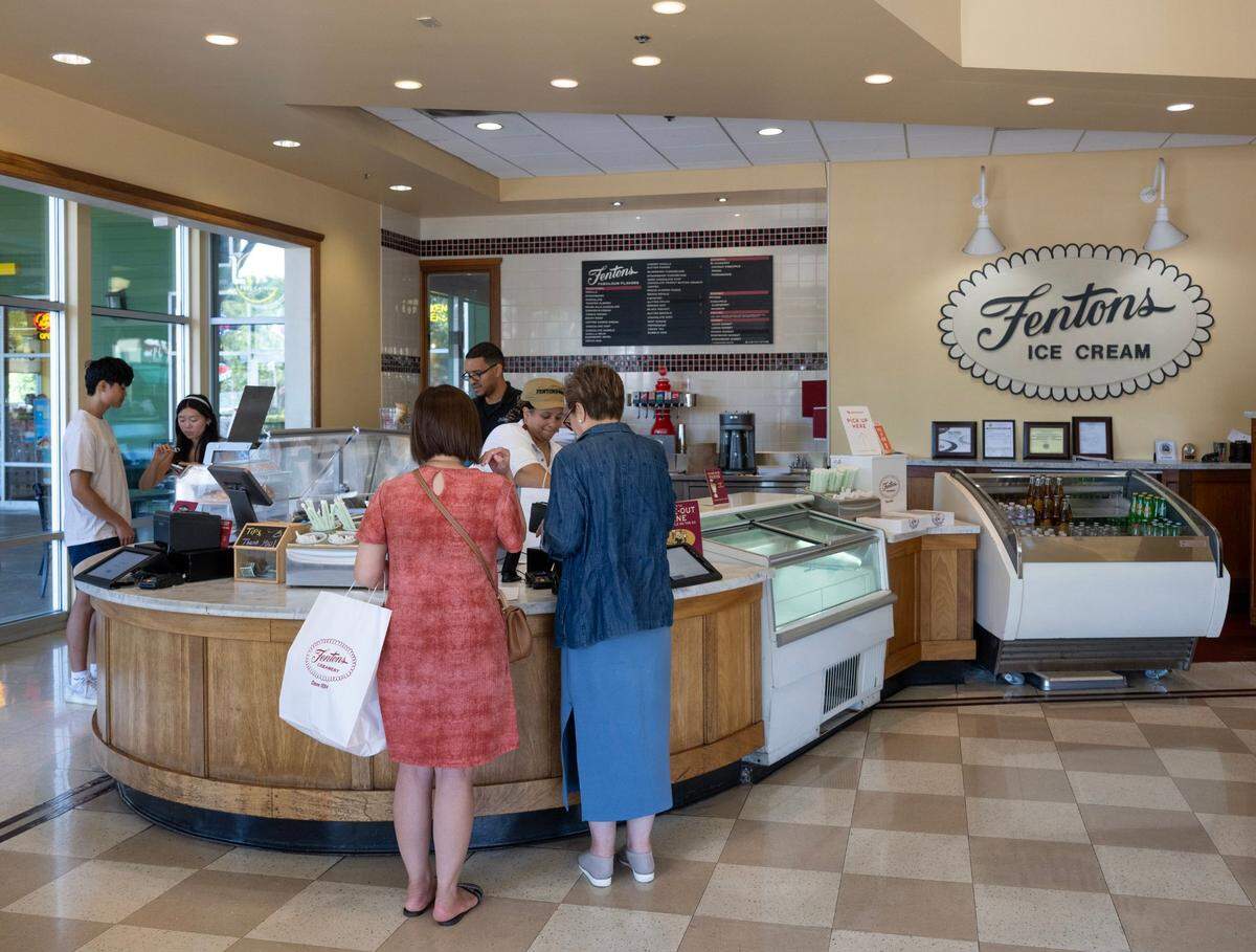 Customers purchase ice cream from Fentons Creamery at the Nut Tree on Thursday in Vacaville. The creamery was founded in Oakland in 1894.