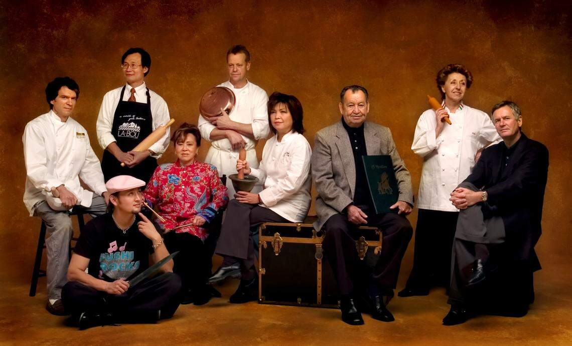 A pantheon of influential members of Sacramento’s food scene in 2006: from left, longtime chef for the Paragary Restaurant Group Kurt Spataro, Mikuni chef Taro Arai (sitting), La Bou founder Trong Nguyen, Fat City chef and food director Lina Fat, Waterboy chef and owner Rick Mahan, Lemon Grass chef and owner Mai Pham, El Novillero founder Joe Davalos, Biba Caggiano of Biba, and Paragary Restaurant Group owner Randy Paragary.