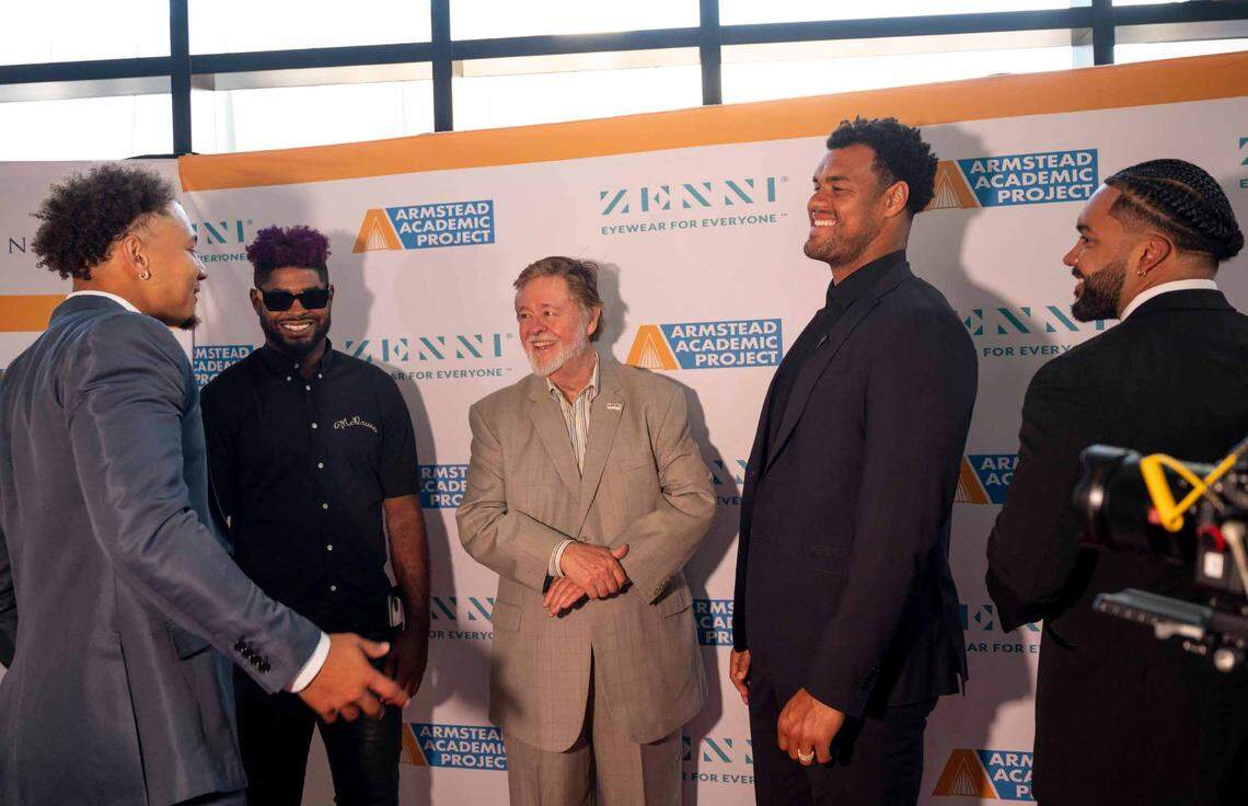 From left, Trey Lance, Jauan Jennings, John York, Arik Armstead and Alex Barrett, of the San Francisco 49ers, share a light moment while standing on the red carpet at the Armstead Academic Project’s Kick Off For Kids Gala on Thursday at the Kimpton Sawyer Hotel.