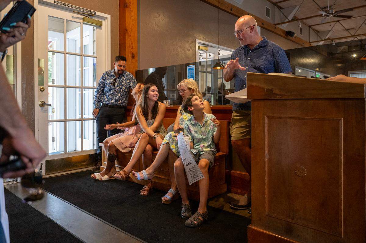 Ed Newman, and his family, son Ryan, 10, wife Carrie Newman and daughter Kyla, 16 waited over 90 minutes for a table on the second to the last day of service at the Rio City Cafe in Old Sacramento on Friday.