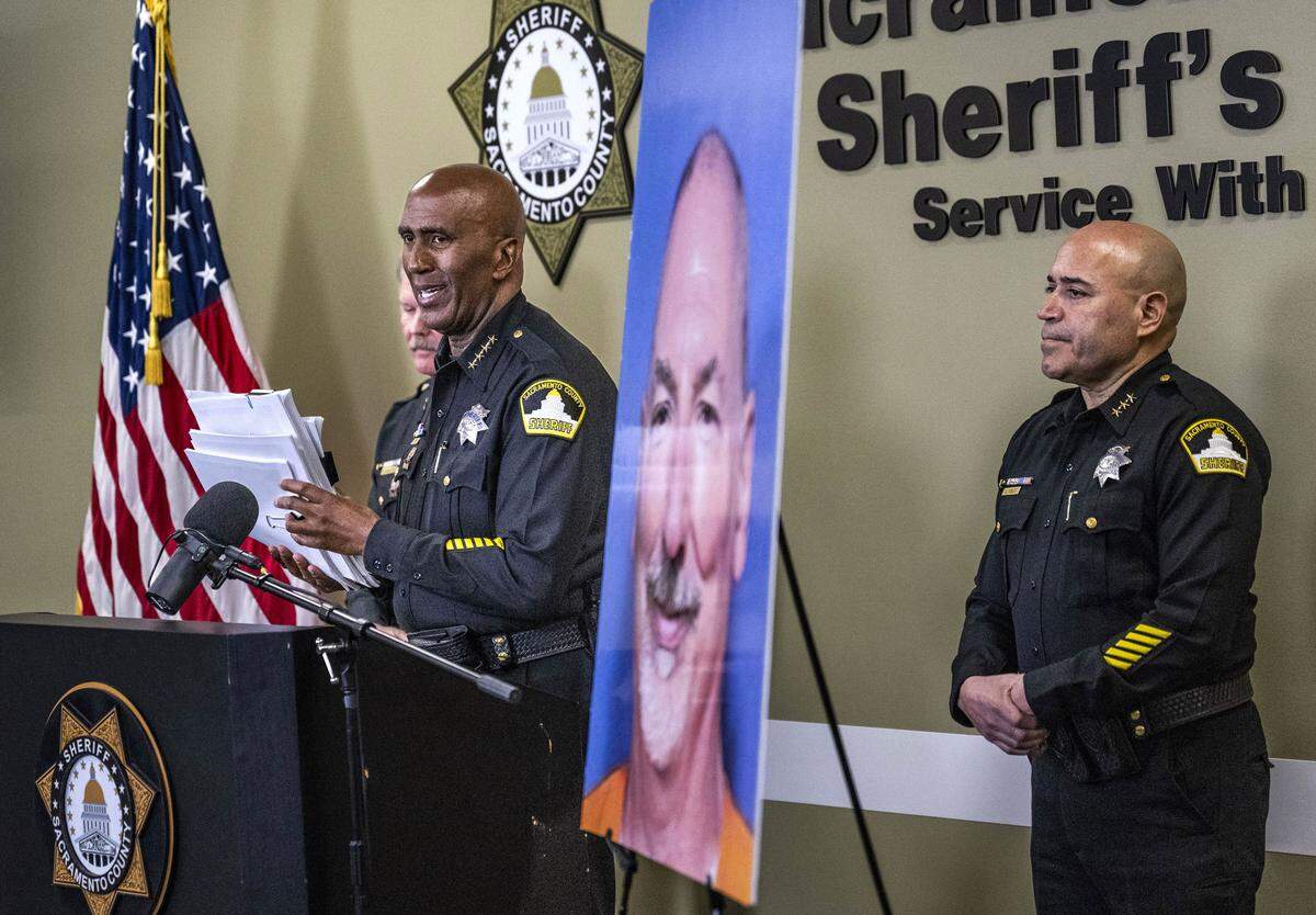 Sacramento Sheriff Jim Cooper holds a stack of victim statements during a news conference on Monday, Feb. 23, 2026, at the Sheriff's office headquarters, about the early release of David Allen Funston, who was convicted of 16 counts of kidnapping and child molestation in 1999. 
