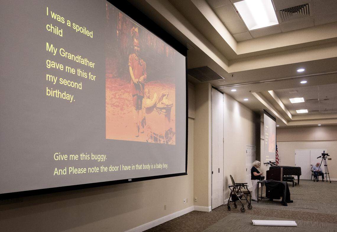Images of Liz Igra were projected on the screens of the auditorium at Eskaton Village  in Carmichael while she gave her Holocaust presentation on Tuesday, March 24, 2026.