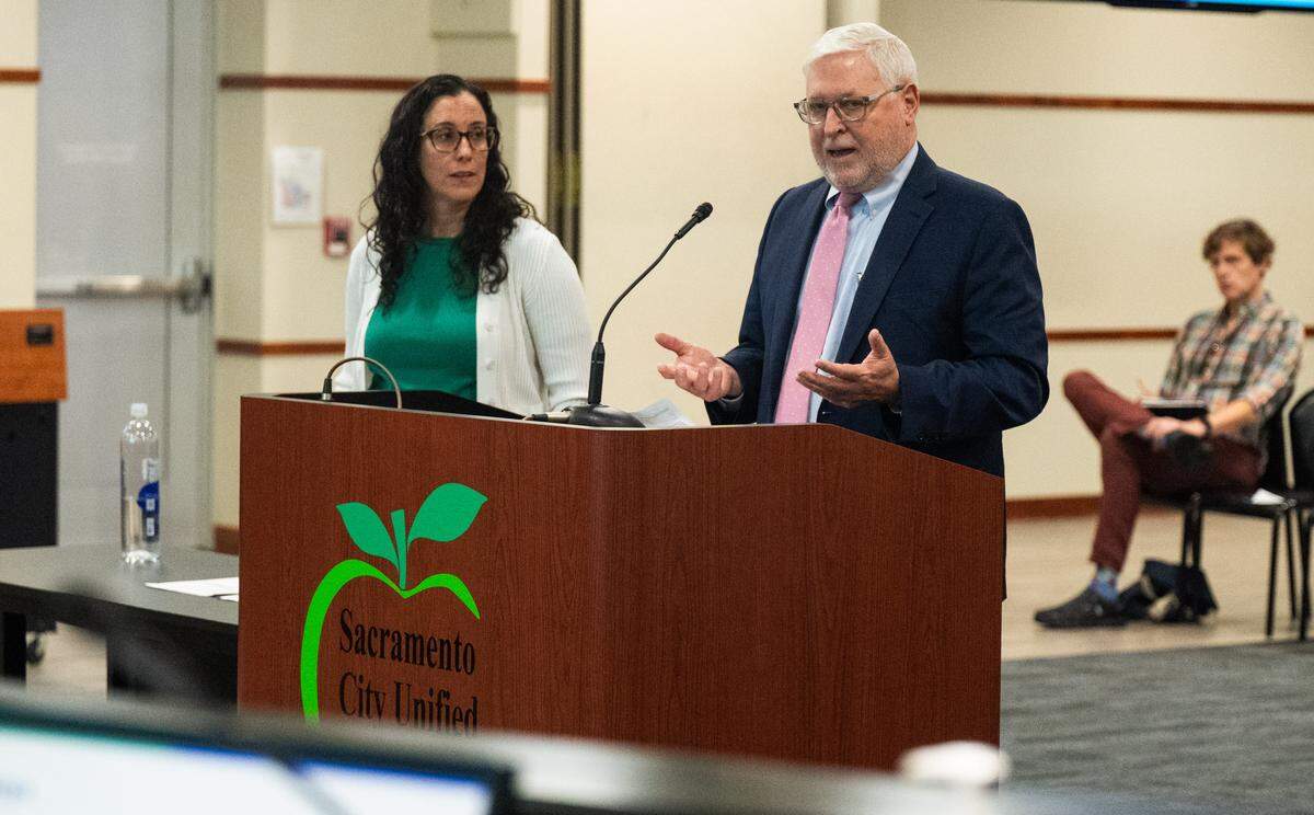 David Fine, CEO of the Fiscal Crisis and Management Assistance Team, reviews Sacramento City Unified School District’s financial situation during a board meeting at the Serna Center on Thursday.