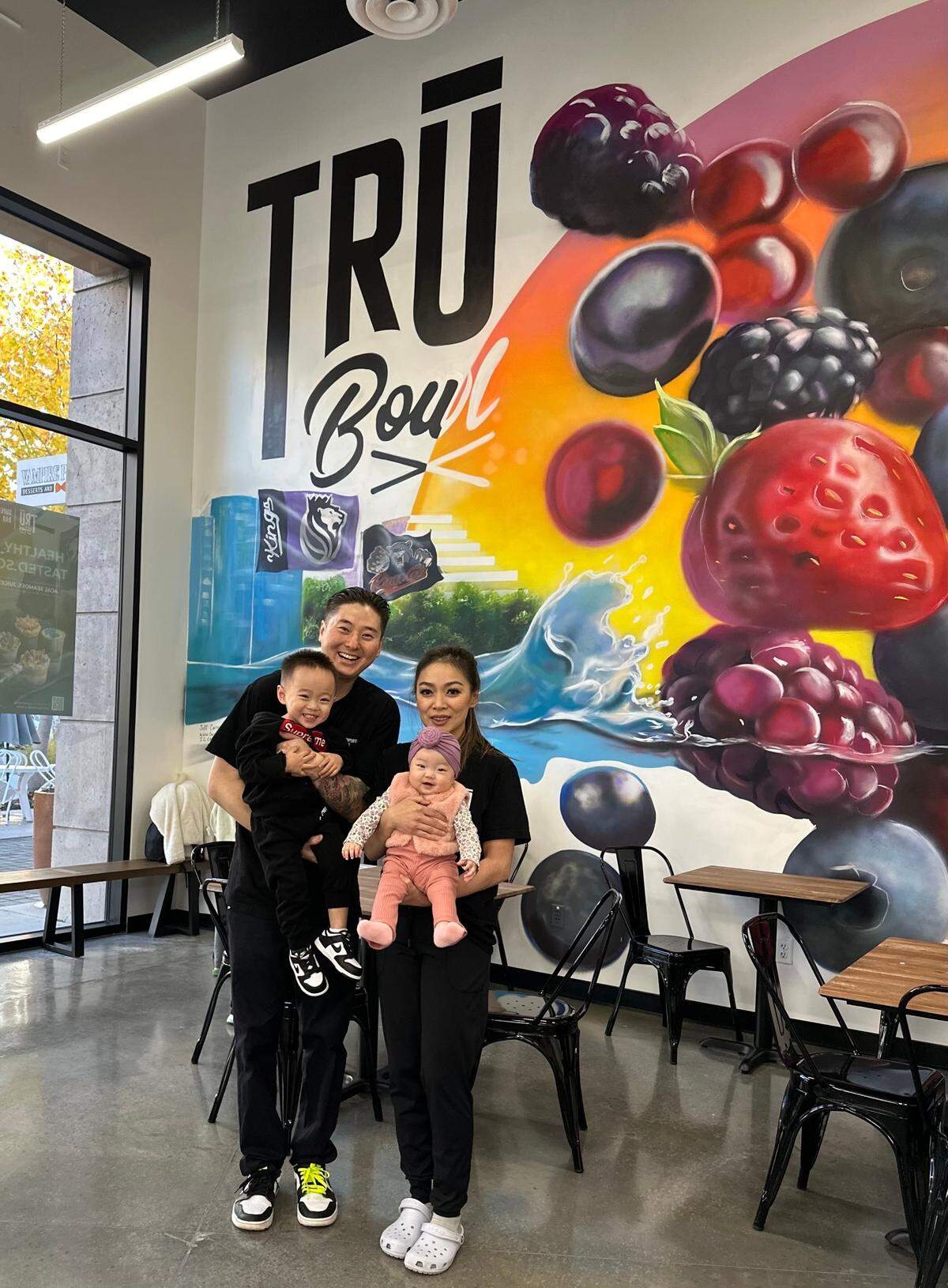 Tru Bowl Superfood Bar, owned by the Chan family, held it’s soft opening Monday, November 11, 2024. Pictured are owners Cassidy Chan and Lindai Do and their children Ryder and Emily.