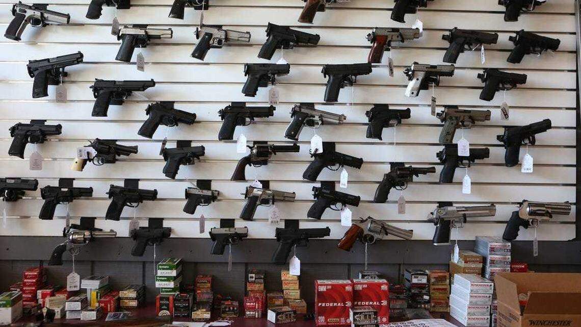 Handguns are displayed at a gun store in Palm Springs in 2019.
