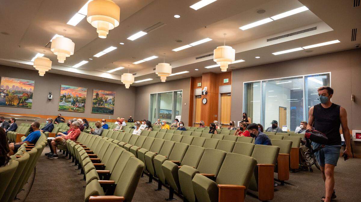 People take their seats immediately before the Sacramento City Council meeting begins Tuesday, Aug. 16, 2022, the first meeting back open to public attendance at City Hall since the beginning of the COVID-19 pandemic. The city this week decided to no longer allow public comments via phone during meetings.
