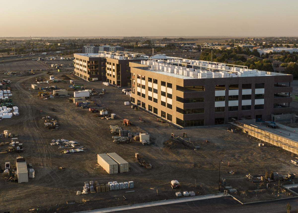 The Centene office complex is taking shape near Interstate 5 in the North Natomas neighborhood of Sacramento at sunset on Monday, Oct. 14, 2019.