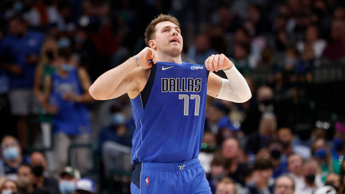 Dallas Mavericks guard Luka Doncic (77) reacts after a foul called against them as they played the Sacramento Kings during the first half of an NBA basketball game in Dallas, Sunday, Oct. 31, 2021. (AP Photo/Michael Ainsworth)