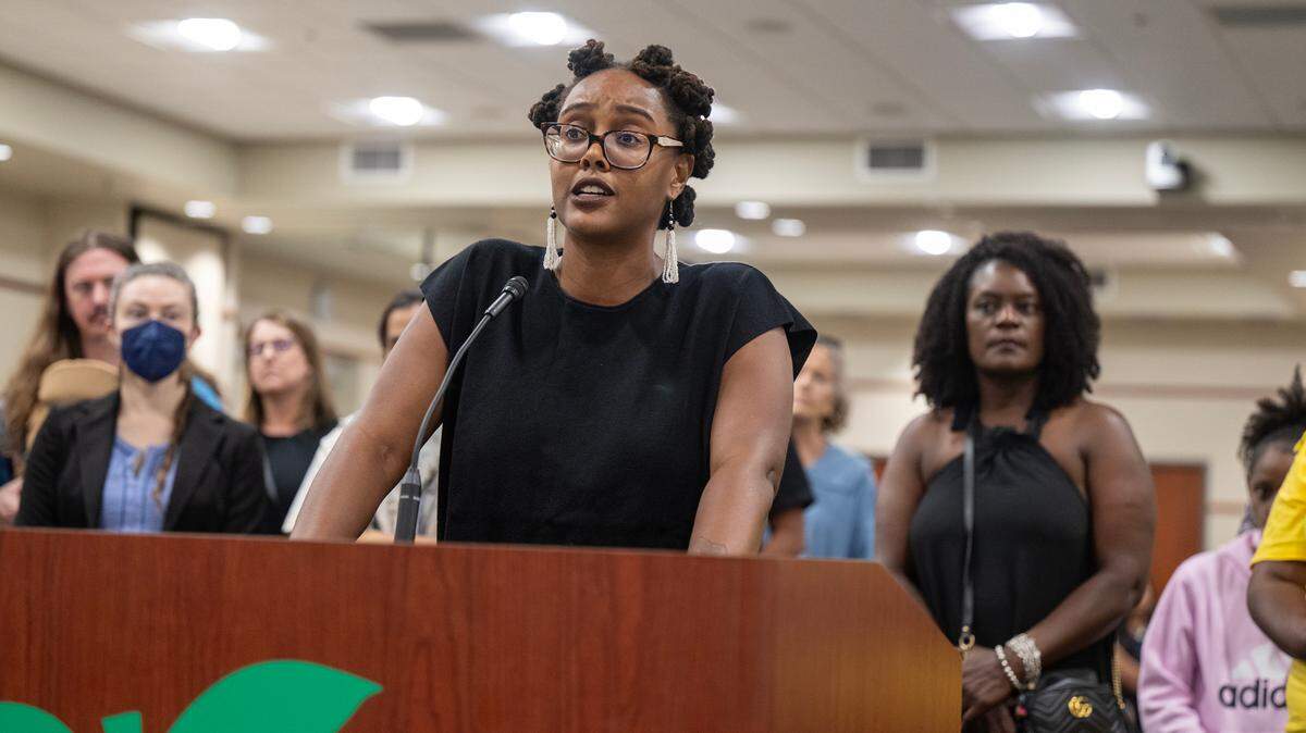 Erinn Leone, a teacher at Luther Burbank High School, addresses the Sacramento City Unified school board on Thursday.