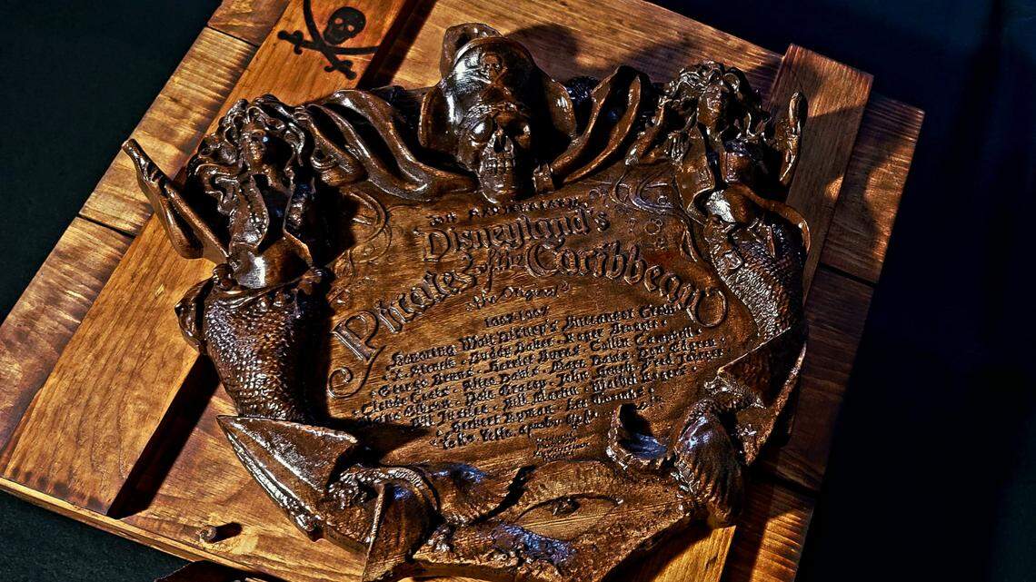 Pirates of the Caribbean plaque created from trees that stood at the ride until their demise