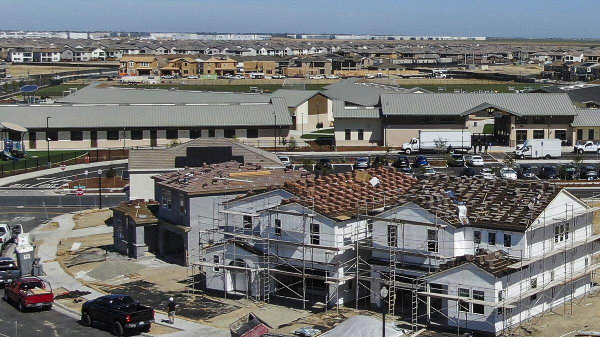 Homes are under construction near Northlake TK-8 School in Sacramento in 2024. A child was hit Thursday at the intersection at left while cycling to the school.