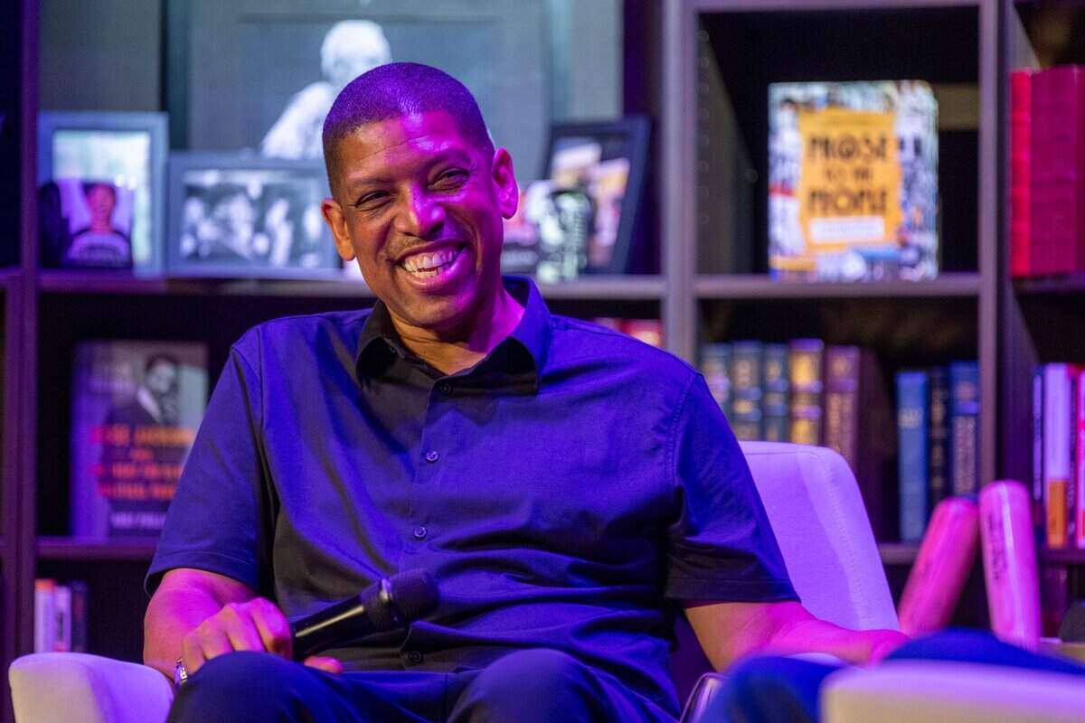 Former Sacramento Mayor Kevin Johnson speaks with Dusty Baker about Baker’s memoir "Crossroads" during an event at The Guild Theater in Sacramento on Monday.