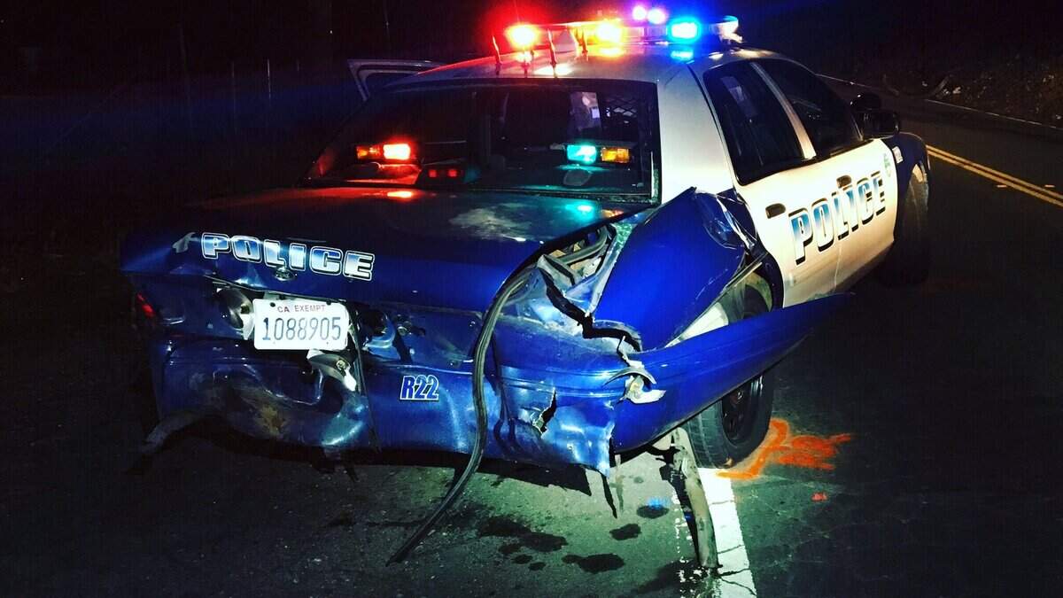A Redding police officer’s patrol car was rear ended by a suspected drunk driver Thursday night.