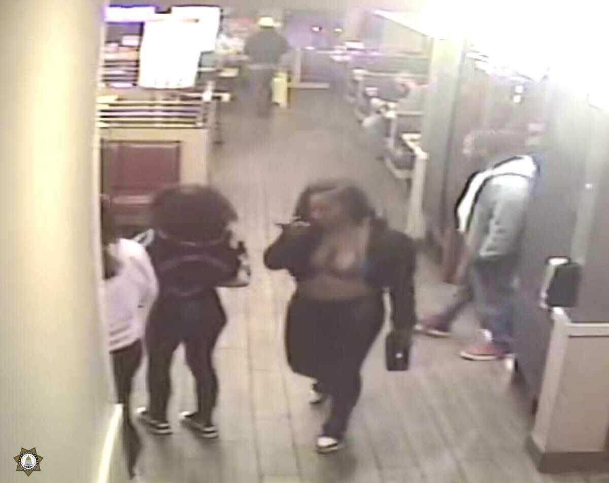 A female suspect connected to the assault of an IHOP employee walks through the restaurant while talking on the phone on April 30, 2023. Two female suspects are wanted in the case where the victim suffered significant injuries after allegedly being knocked to the ground and beaten, deputies said. The Sheriff’s Office said it is looking for the public’s assistance in identifying and locating the suspects.