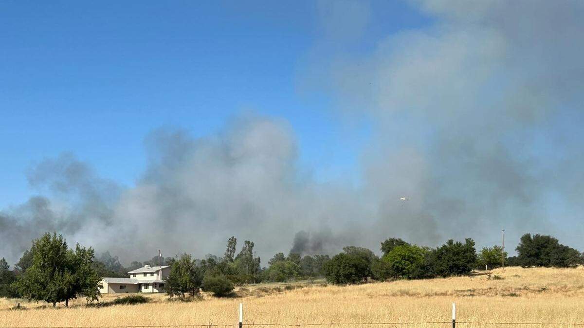 A fire prompted evacuations near the Butte County town of Palermo on Wednesday, a few miles south of where the large Thompson Fire has already caused thousands to be ordered to evacuate.