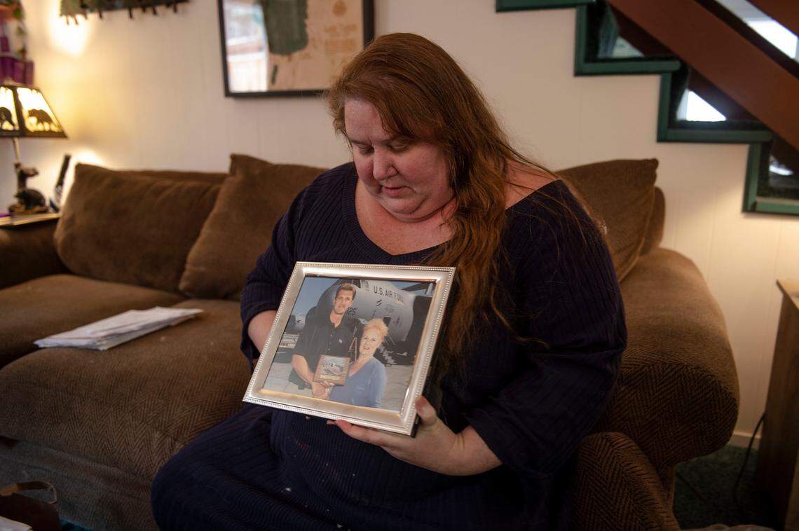 Tracy Sellers, a resident of Tahoe, holds a picture of her mother in her home, Monday, August 5, 2019. Her mother, Dolores Sellers was on hospice care and was allegedly given an overdose of drugs administered by a hospice nurse in August of 2018. Later Sellers died of natural causes in October of last year.