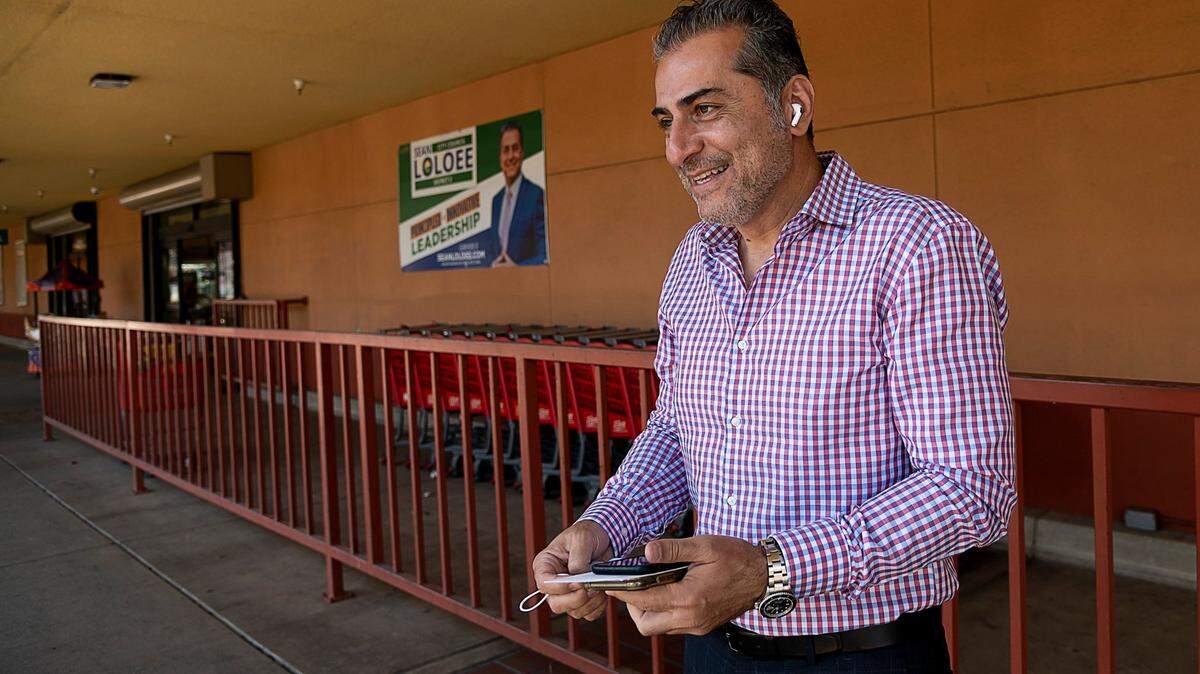 Sean Loloee stands outside Viva Supermarket in Sacramento’s Del Paso Heights neighborhood on Wednesday, Nov. 4, 2020. Loloee, who owns the market, was leading City Councilman Allen Warren 54% to 45% as of Wednesday morning.