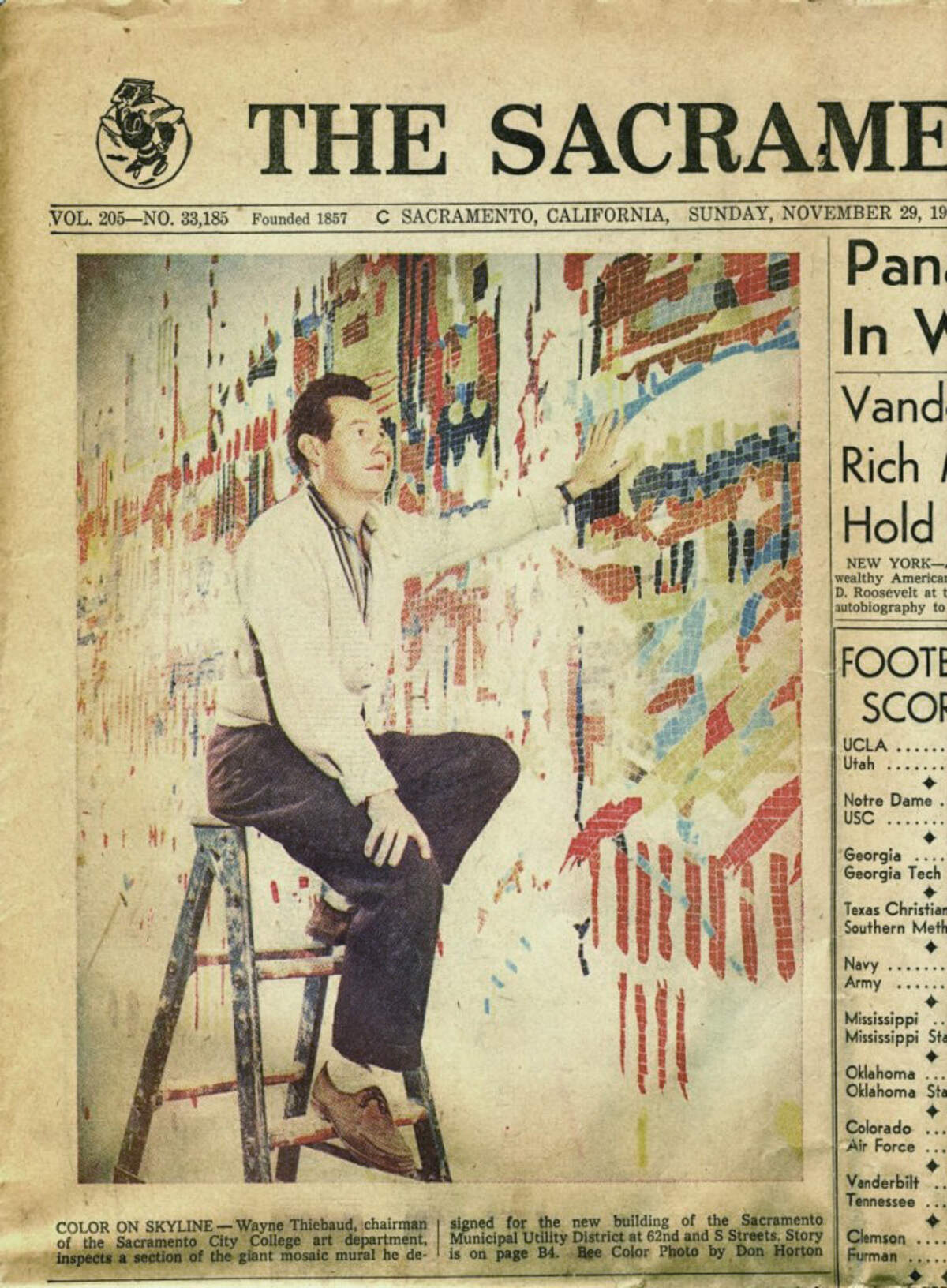 Artist Wayne Theibaud inspects his mosiac mural for the new Sacramento Municipal Utility District building in 1959.